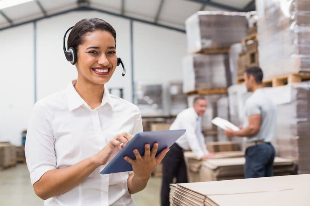 Female manager using inventory management software