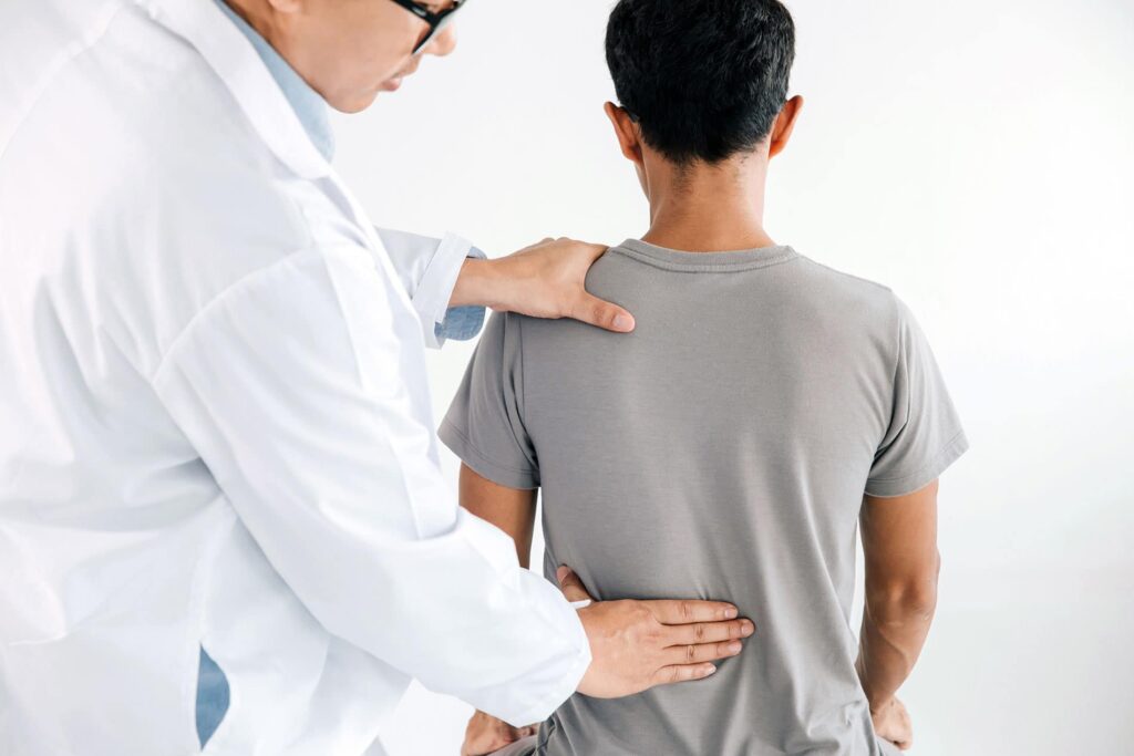 Physiotherapist doing healing chiropractic treatment